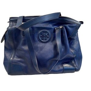 Tory Burch Y2K slouchy blue pebble leather bag.